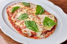 Alla Vita signature dishes Chicken ParmesanWood Fired PizzaCacio e Pepe Arancini